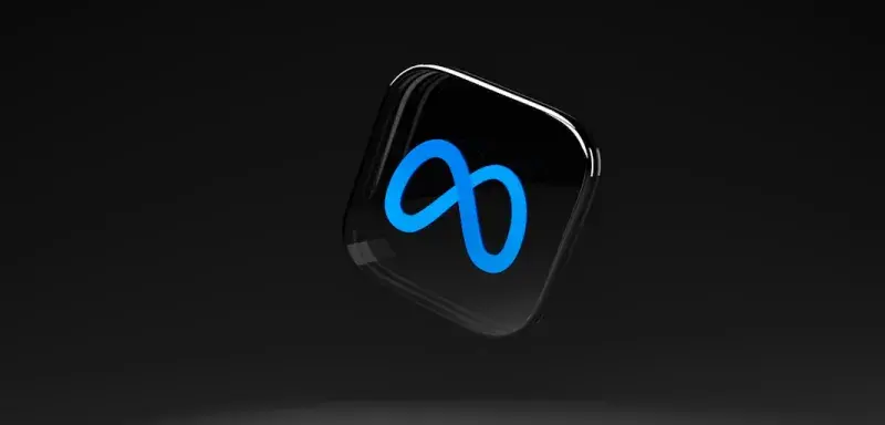 Logo Meta sur fond noir représentant l'entreprise qui abandonne son application de bureau virtuel