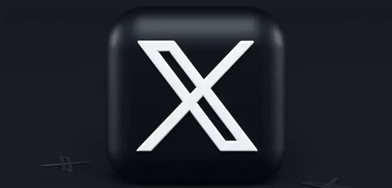 Logo du réseau social X sur fond noir