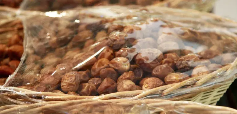 brown and white stones in clear plastic bags