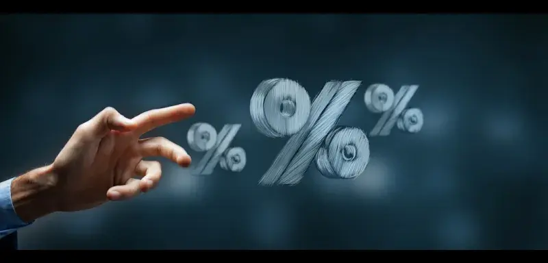 Hand reaching towards floating percentage symbols