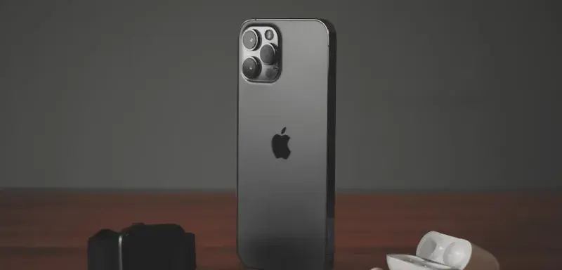black iphone 7 with white and black dice
