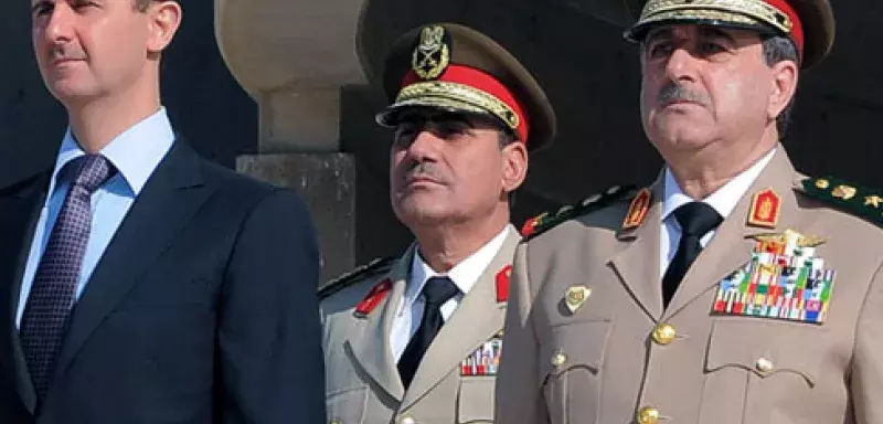 Les hommes du régime resserrenr les rangs (DR)