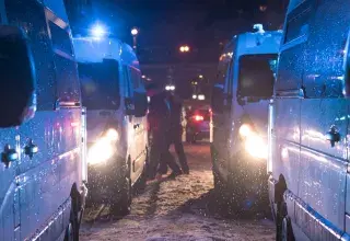 a group of trucks parked next to each other