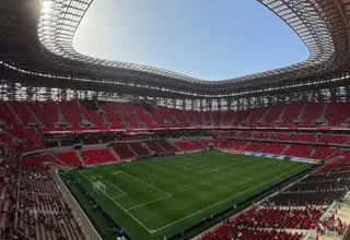 Stunning aerial shot of a vibrant stadium filled with fans in Morocco.