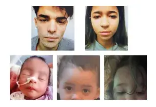 baby covered with white blanket