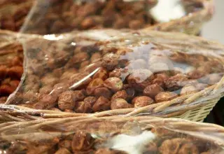 brown and white stones in clear plastic bags