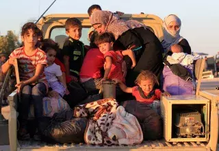 Des dizaines de milliers de personnes ont été déplacées par les combats... (Xinhua)